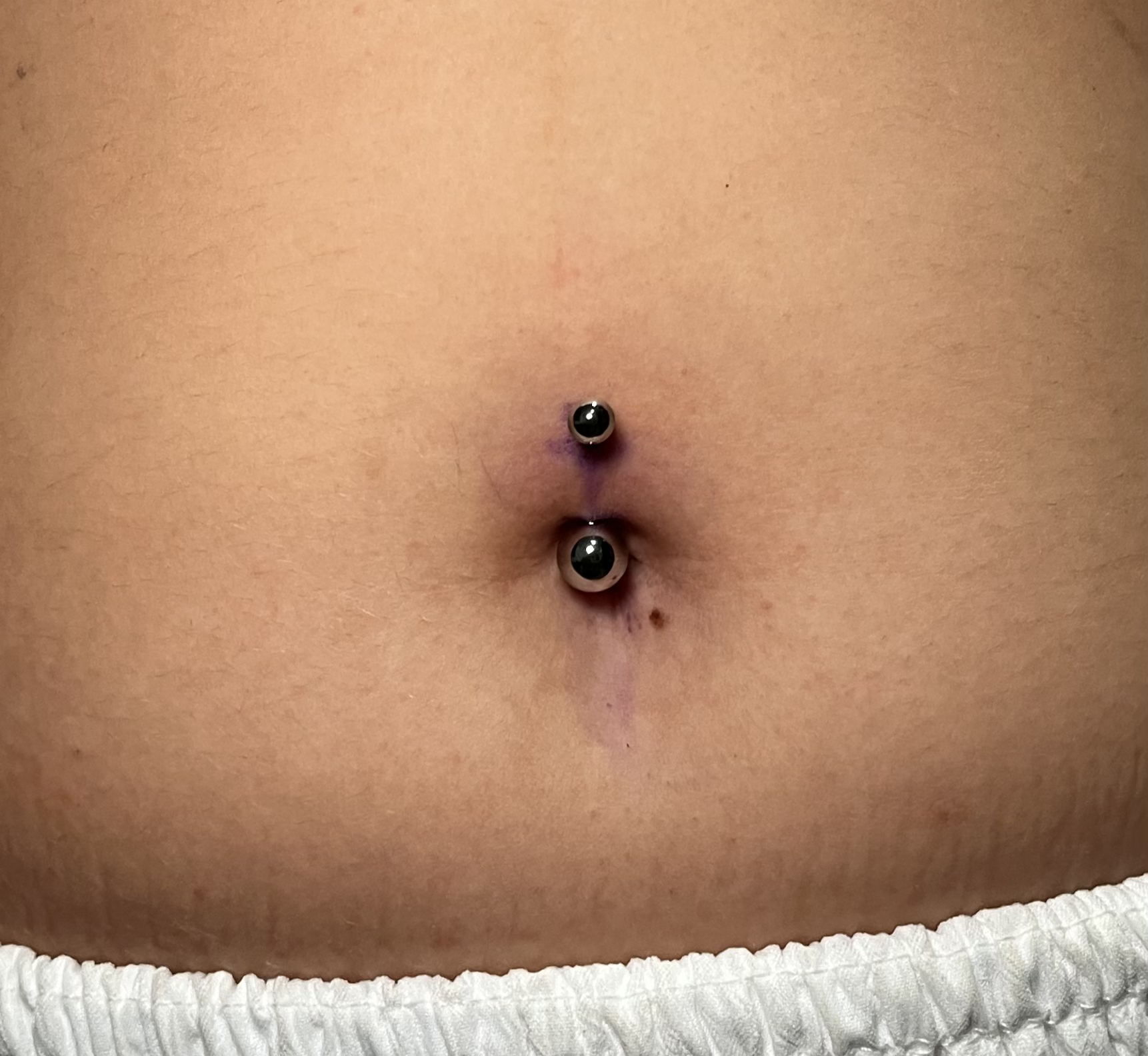 Greka piercing 12